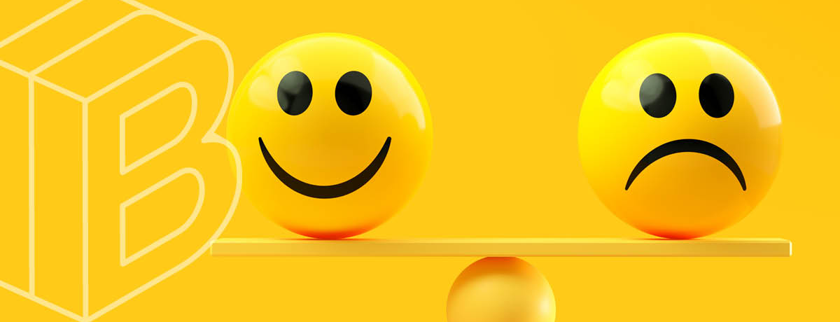 Banner image of a scale with a happy face on one side and a frowny face on the other