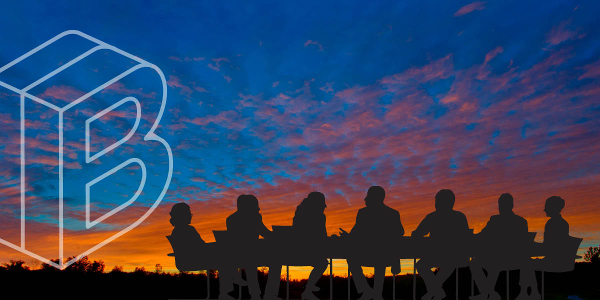 Banner image: silhouette of board members sitting at a table against a sunset