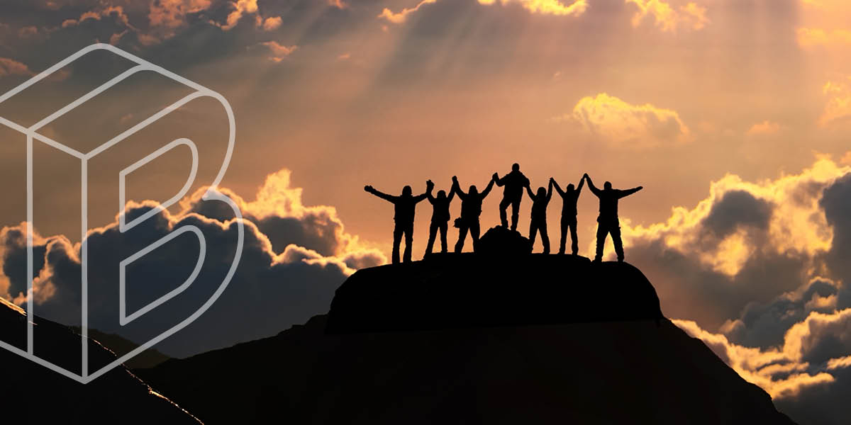 Banner: Silhouettes of people standing on top of a mountain, holding hands in victory