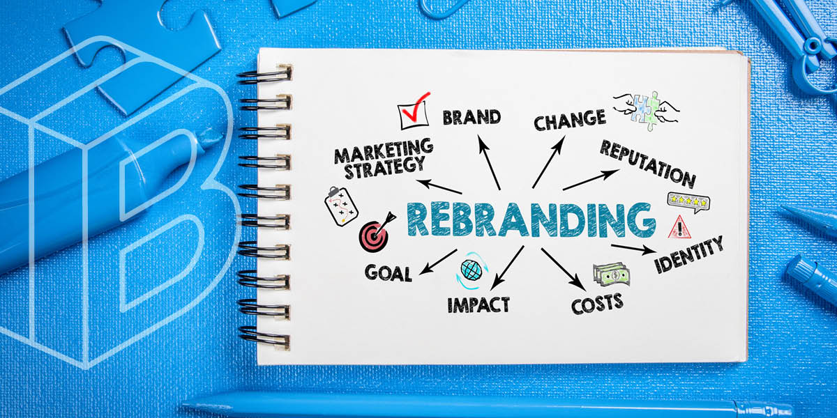 Banner: Notebook with the word 'REBRANDING' in the center of a page